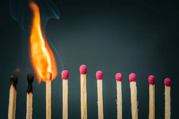 Group Wooden Matches Fire Burning Dark Background Physical Distancing Avoiding — Stock Photo, Image