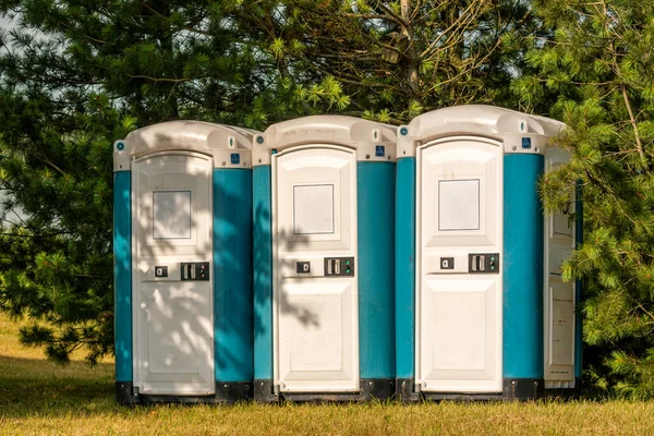 Three Plastic Portable Toilets Outdoor Event — Stock Photo, Image