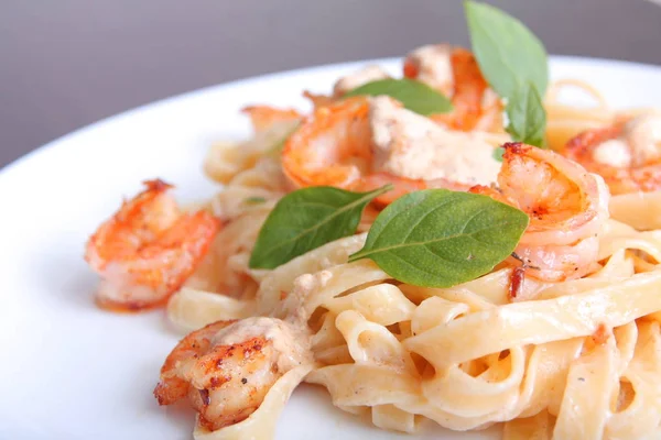 Delicious shrimp pasta with basil