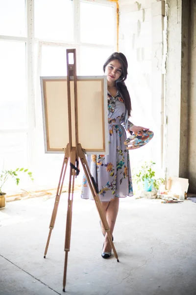 Young beautiful lady painter in dress, woman artist painting — 스톡 사진