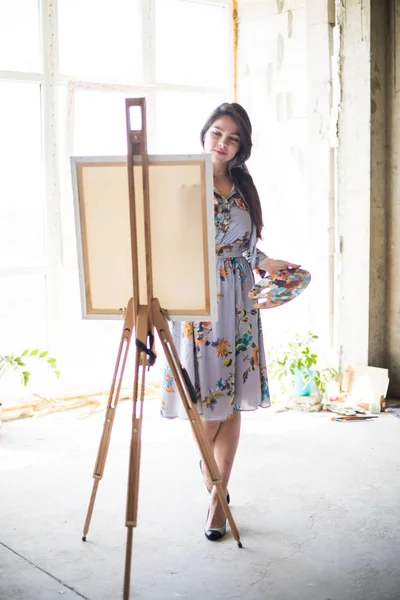 Young beautiful lady painter in dress, woman artist painting — 스톡 사진