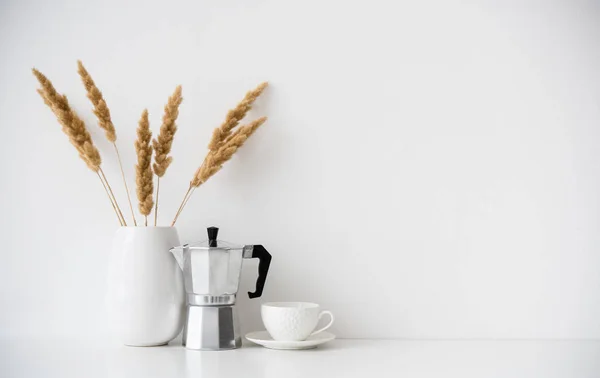 White home decor, coffee maker, ceramic vase and cup on tabletop, contemporary interior