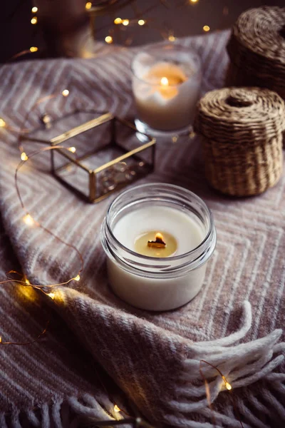 Burning hand-made candle with wooden wick in glass jar — Stock Photo, Image