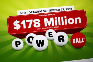 MONTREAL, CANADA - SEPTEMBER 23, 2018: Powerball official site and logo on a laptop screen. Powerball is a popular American lottery game offered by 44 states in USA clipart