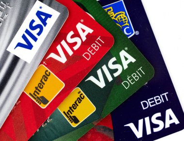 MONTREAL, CANADA - SEPTEMBER 21, 2018: Visa plastic payment cards of different canadian banks. clipart