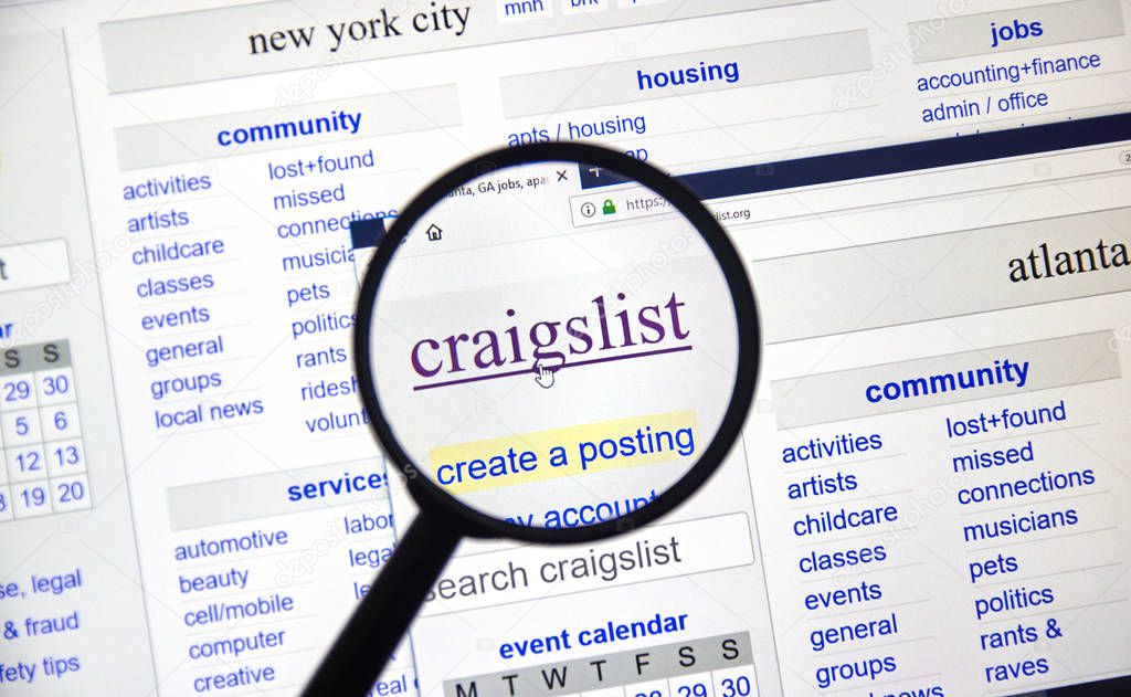 MONTREAL, CANADA - DECEMBER, 24 2018: Craigslist page under magnifying glass. Craigslist is an American classified advertisements website with jobs, housing, sale, services, community listings.