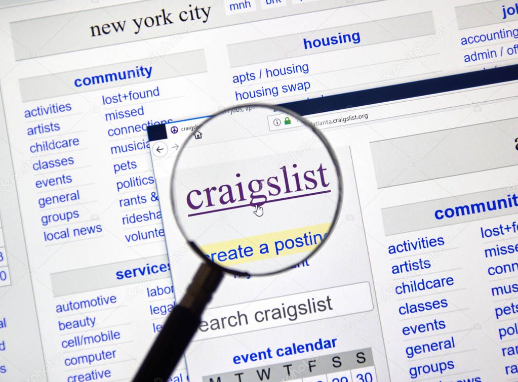 MONTREAL, CANADA - DECEMBER, 24 2018: Craigslist page under magnifying glass. Craigslist is an American classified advertisements website with jobs, housing, sale, services, community listings.