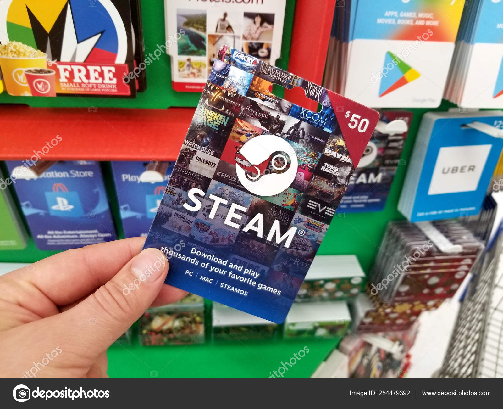Steam Gift Card In A Hand Stock Editorial Photo C Dennizn 254479392 - roblox gift card walmart in store