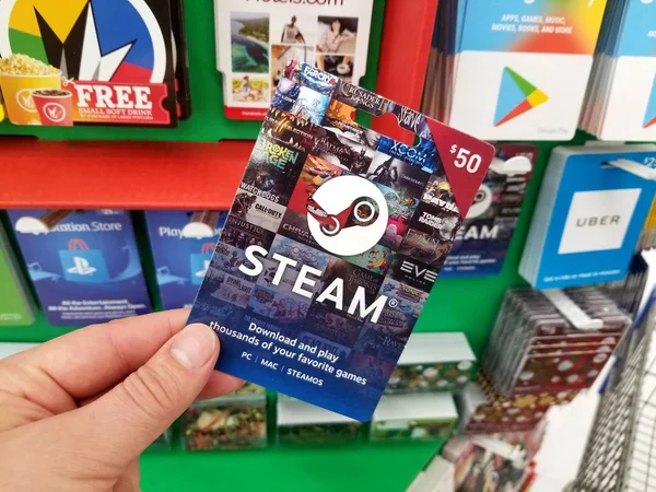 Stoom giftcard in een hand — Stockfoto