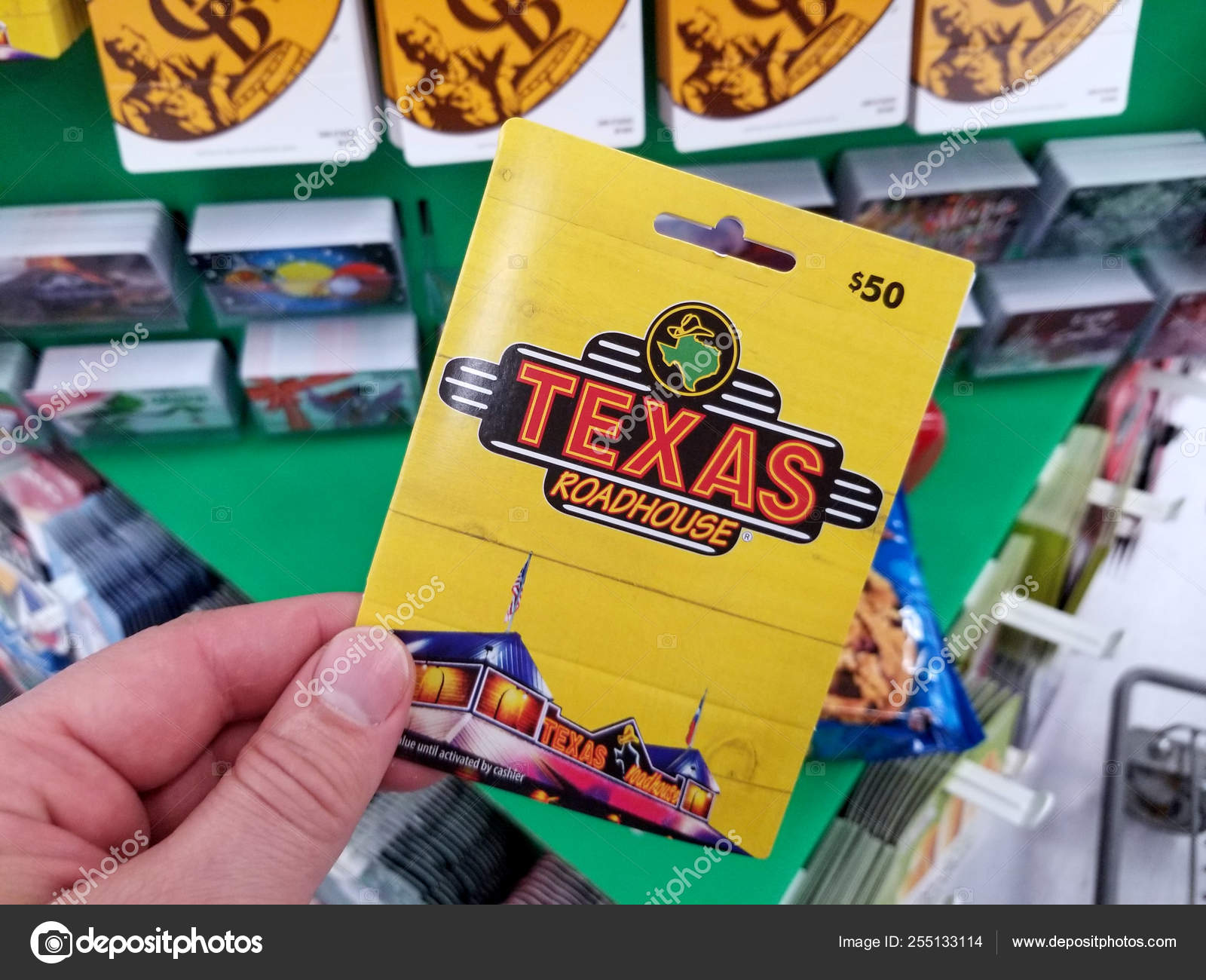 Texas Roadhouse gift card in a hand Stock Editorial Photo © dennizn