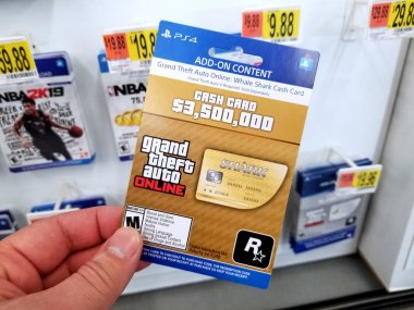 Bir elinde bir video oyunu Hediye kartı