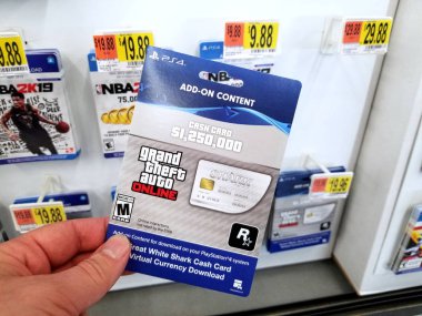 Bir elinde bir video oyunu Hediye kartı