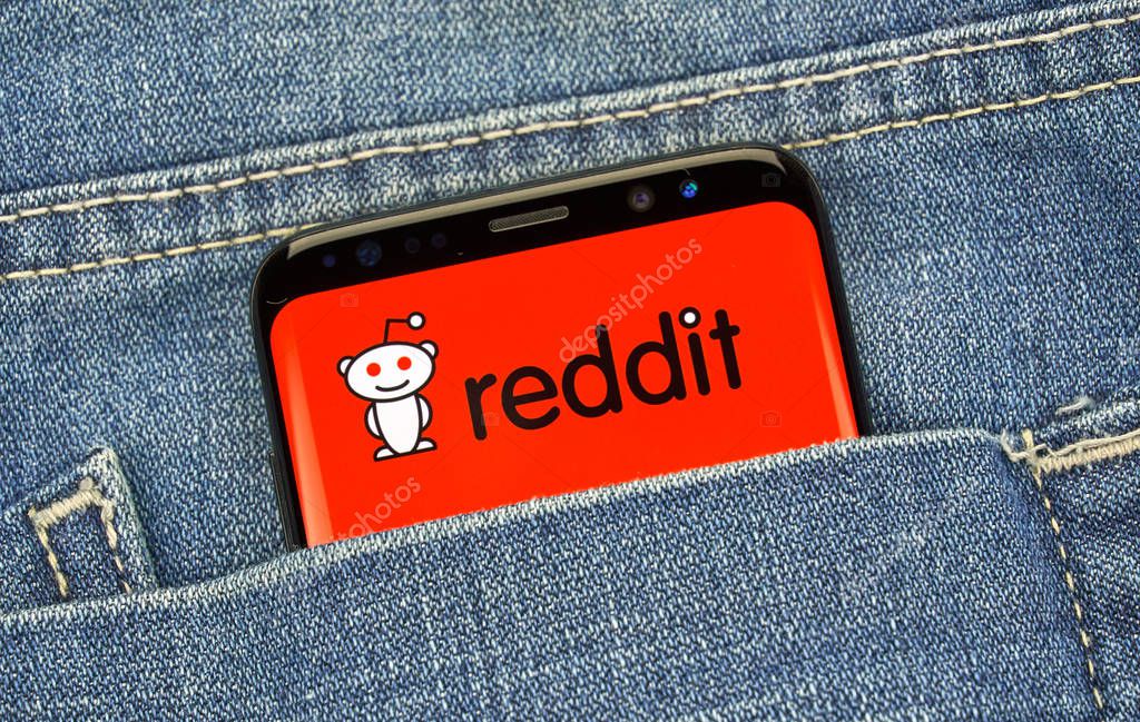 MONTREAL, CANADA - December 23, 2018: Redditt logo and android app on Samsung s8 screen. Reddit is an American social news aggregation and web content rating as well as and discussion website.