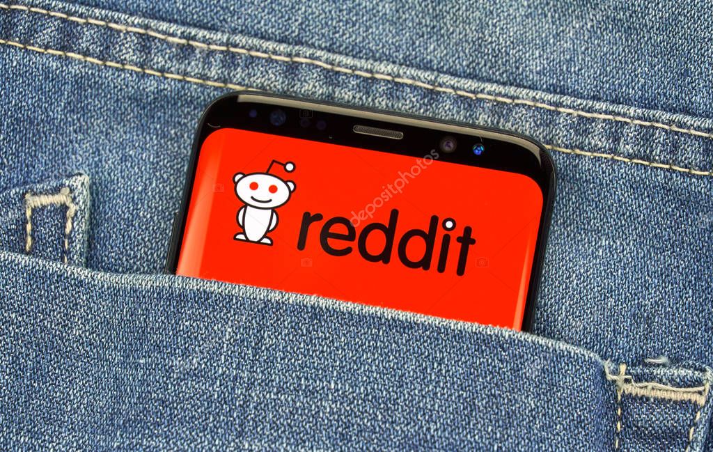 MONTREAL, CANADA - December 23, 2018: Redditt logo and android app on Samsung s8 screen. Reddit is an American social news aggregation and web content rating as well as and discussion website.