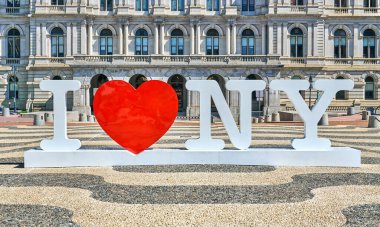 Albany, NY, USA - September 7, 2019: I love NY symbols in front of The New York State Capitol. The New York State Capitol, the seat of the New York State government