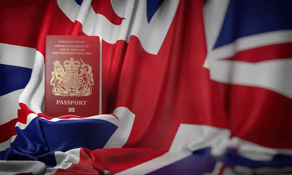 Британский паспорт на флаге Великобритании. Getting a — стоковое фото