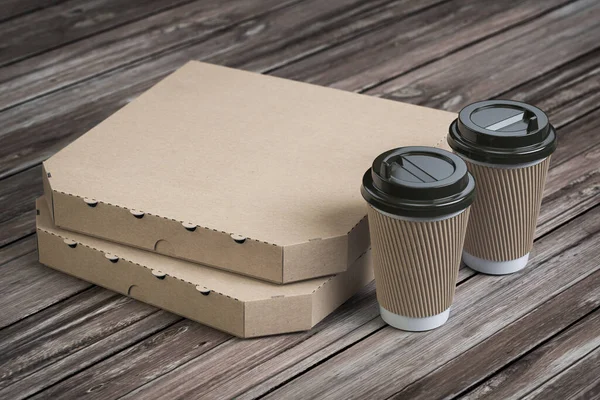 Pizza boxes and coffee plastic cups on vintage wooden planks. Fast food take away mock up. 3d illustration