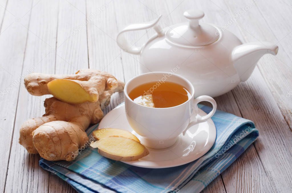 Ginger tea on a wooden table