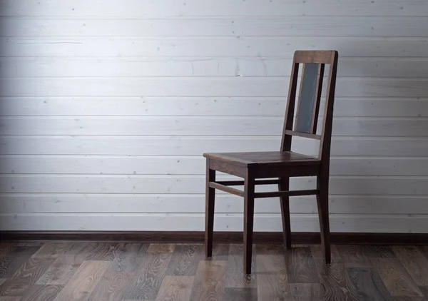Cadeira no chão de madeira — Fotografia de Stock