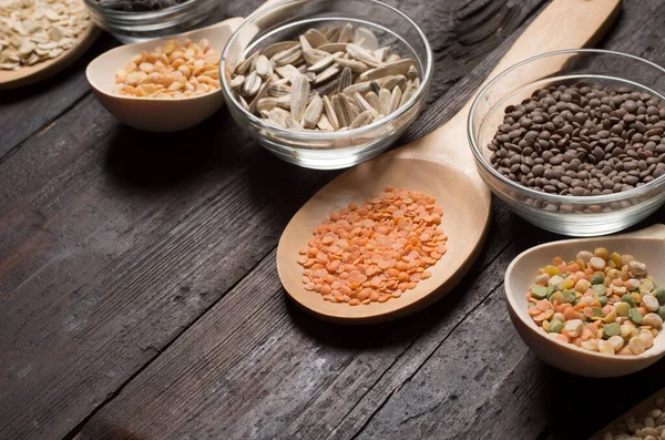 Cereals on wooden background — Stock Photo, Image