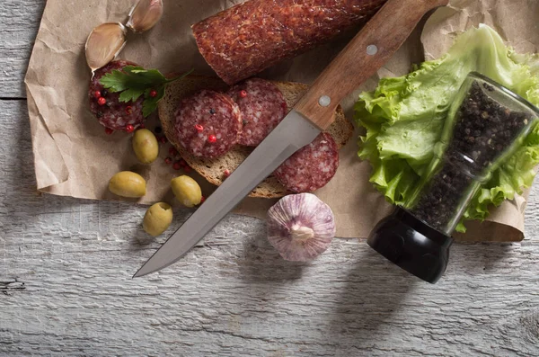 Salami and bread — Stock Photo, Image