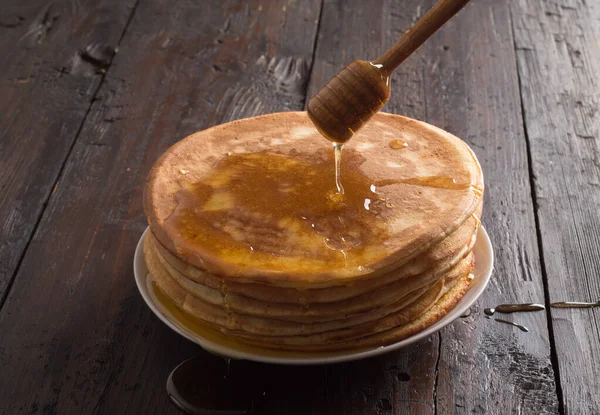 Pancakes on a wooden table — Stock Photo, Image