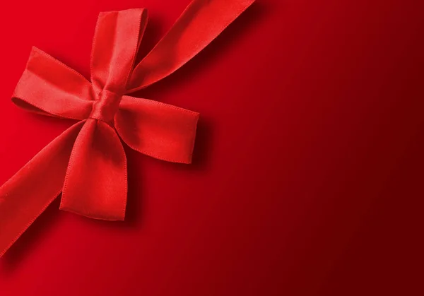 Red Gift Ribbon Wrapped Red Background — Stock Photo, Image