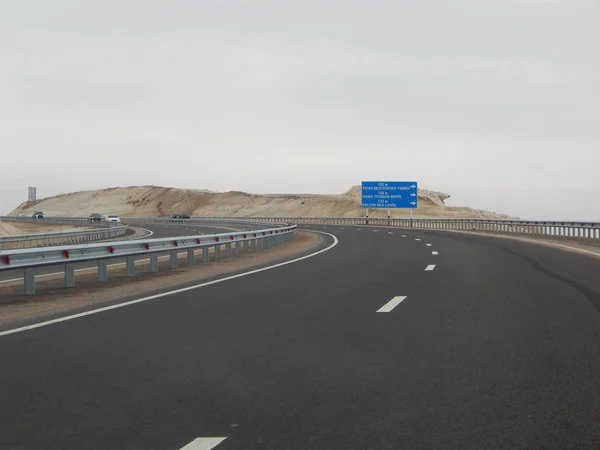 Cars on the road. Mangistau region. Kazakhstan.