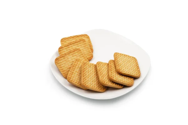 Biscoitos Quadrados Prato Branco Isolado Sobre Fundo Branco — Fotografia de Stock