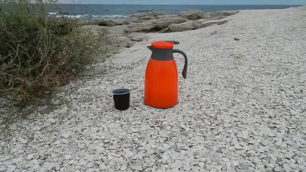 Orange Thermos Shore Caspian Sea Kazakhstan Mangistau Region July 2020 — Stock Video