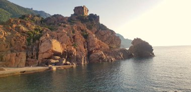 Günbatımı Porto, Korsika, Fransa 'da