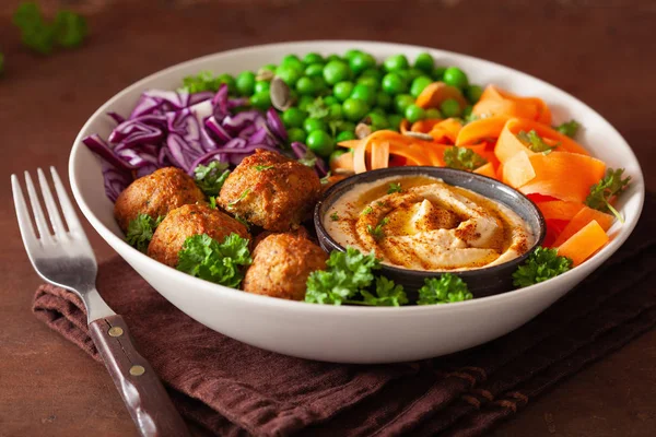 Healthy vegan lunch bowl with falafel hummus carrot ribbons cabb — Stock Photo, Image