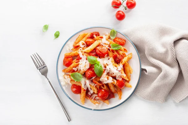 Italian penne pasta with tomatoes parmesan basil — Stock Photo, Image