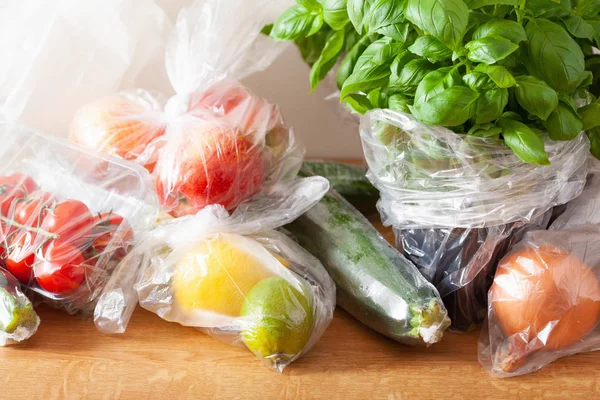 single use plastic waste issue. fruits and vegetables in plastic