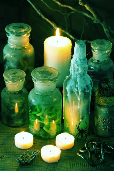 Witch apothecary jars magic potions book halloween decoration — Stock Photo, Image