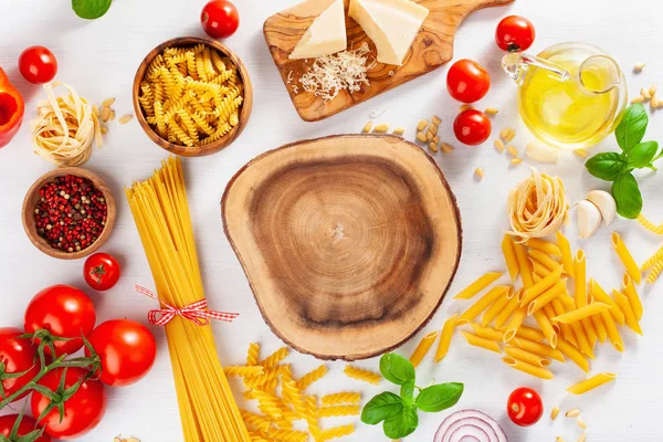 Ingredients for italian cousine flat lay, pasta spaghetti penne — Stock Photo, Image