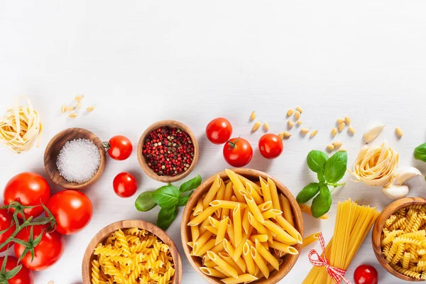 Ingredients for italian cousine flat lay, pasta spaghetti penne — Stock Photo, Image