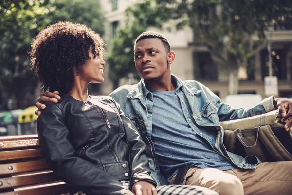 Young happy black couple outdoors