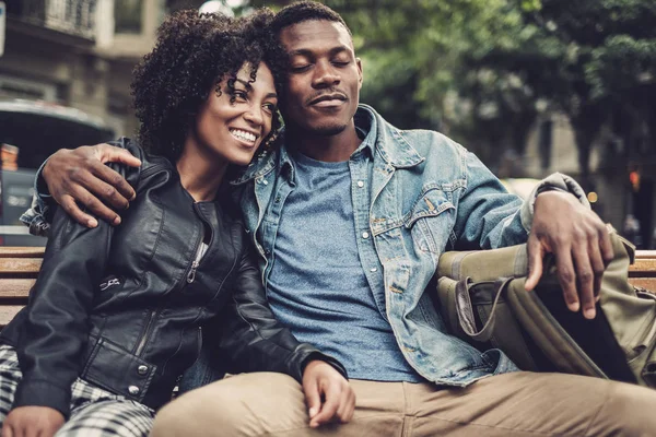 Young happy black couple outdoors