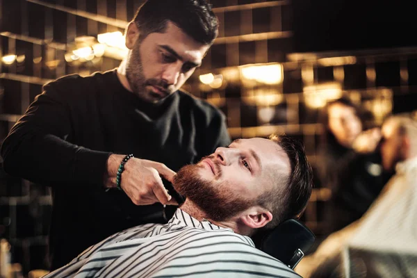 Klanten in de barbershop — Stockfoto