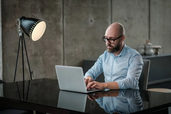 Middle-aged designer working in office — Stock Photo, Image