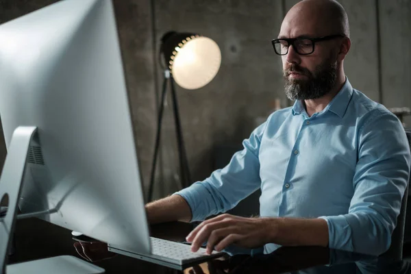 Middle-aged designer working in office — Stock Photo, Image