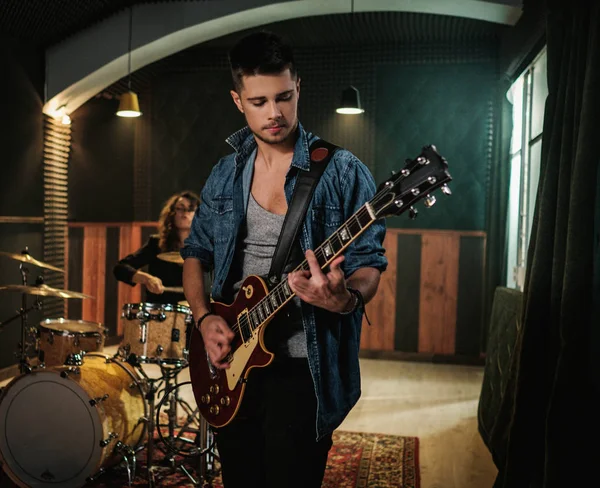 Music band having rehearsal in a studio — Stock Photo, Image
