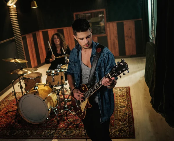 Music band having rehearsal in a studio — Stock Photo, Image