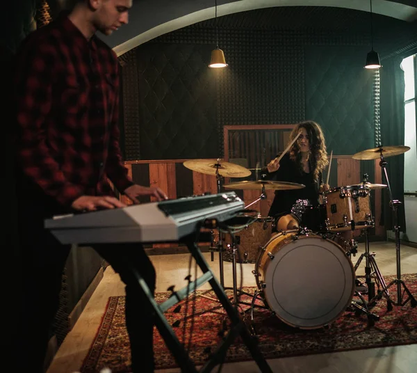 Music band having rehearsal in a studio — Stock Photo, Image