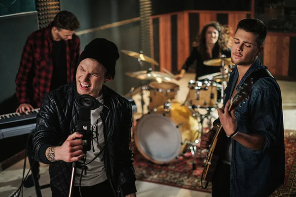 Music band having rehearsal in a studio — Stock Photo, Image