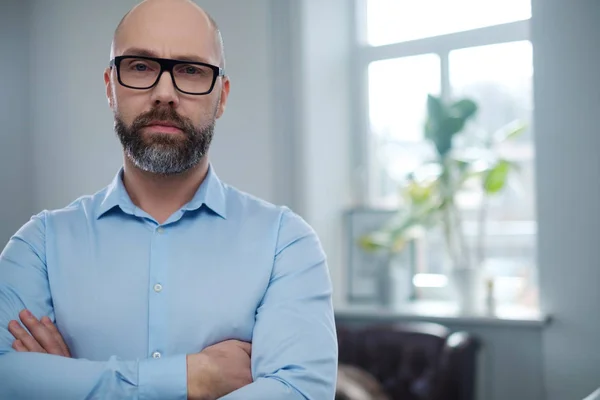 Bearded middle-aged man wearing glasses. — Stock Photo, Image