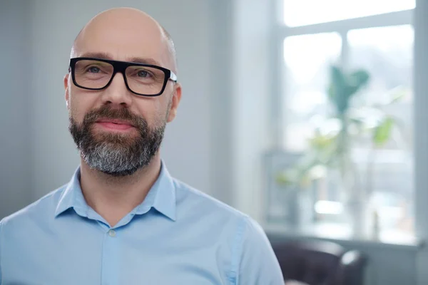 Bearded middle-aged man wearing glasses. — Stock Photo, Image