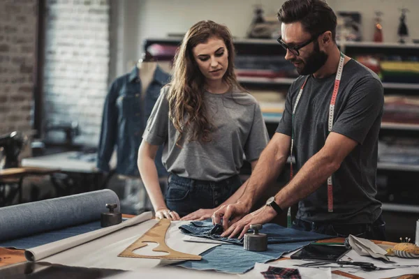 Fashion designer working in his studio — Stock Photo, Image