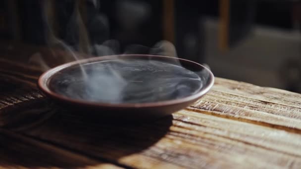 Bowl with a hot tea — Stock Video